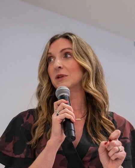 Courtney Greenwood answering questions on a panel at Startup Boston Week 2026